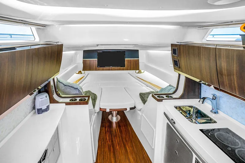 Slide: The Image of Luxurious interior of 2025 Grady-White Canyon 456 boat with modern amenities. - 58