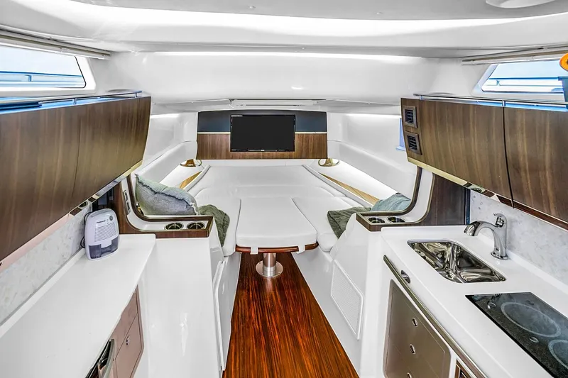Slide: The Image of Luxurious interior of 2025 Grady-White Canyon 456 boat with modern amenities. - 59