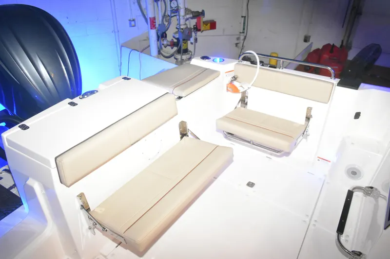 Slide: The Image of 2026 Cutwater C-248 Coupe interior with beige seating and modern design. - 13