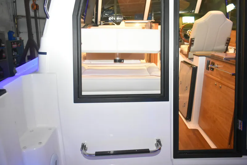 Slide: The Image of 2026 Cutwater C-248 Coupe interior view with seating and helm station. - 36