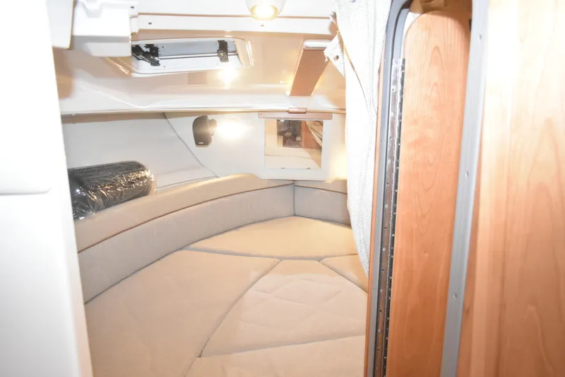 Slide: The Image of Interior cabin of 2026 Cutwater C-248 Coupe, featuring cozy seating and ambient lighting. - 37