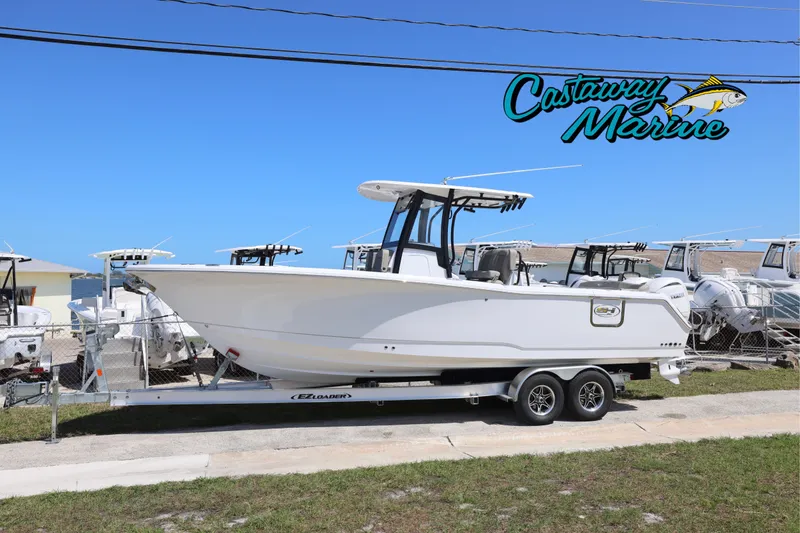 The Image of 2026 Sea Hunt Ultra 275 Coffin Box boat on trailer at Castaway Marine dealership. - 0