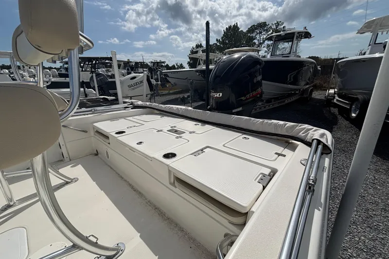 Slide: The Image of 2018 NauticStar 244 XTS boat interior with seating and storage compartments. - 4