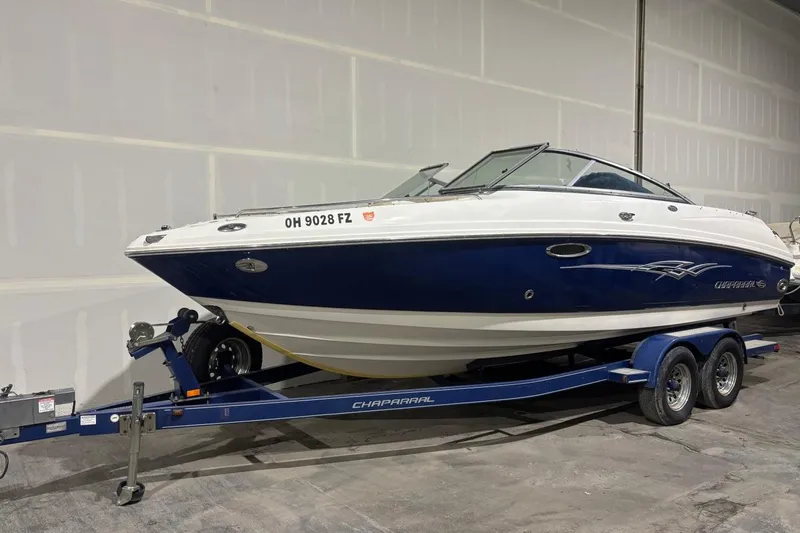 The Image of 2008 Chaparral 246 SSi boat on trailer in indoor storage. - 0