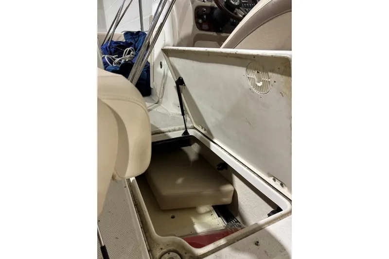 Slide: The Image of Open storage compartment in 2008 Chaparral 246 SSi boat interior. - 17