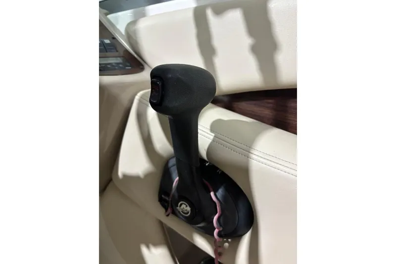 Slide: The Image of Throttle control lever in a 2008 Chaparral 246 SSi boat cockpit. - 21