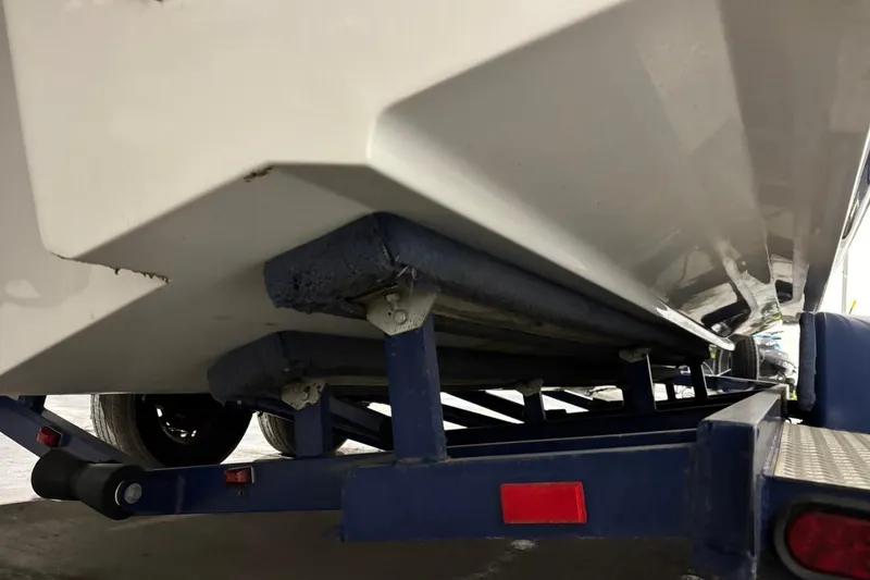 Slide: The Image of 2008 Chaparral 246 SSi boat on trailer, close-up of hull and support. - 38