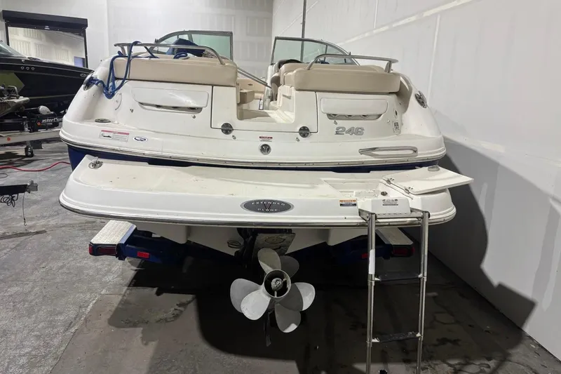 Slide: The Image of 2008 Chaparral 246 SSi boat in storage, rear view with propeller and swim platform. - 4