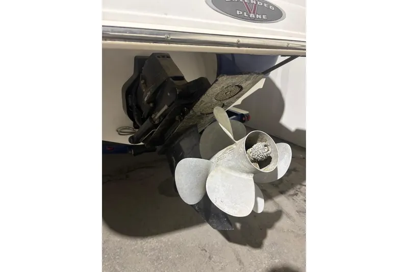 Slide: The Image of Propeller of a 2008 Chaparral 246 SSi boat, showing wear and marine growth. - 5