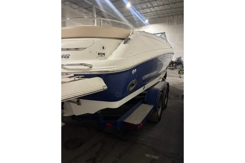 Slide: The Image of 2008 Chaparral 246 SSi boat on trailer in indoor storage facility. - 6