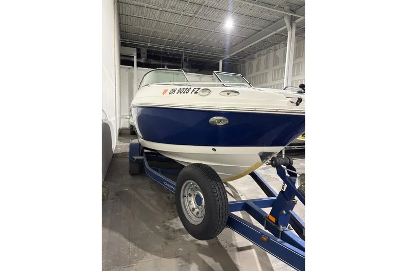 Slide: The Image of 2008 Chaparral 246 SSi boat on trailer in indoor storage facility. - 7