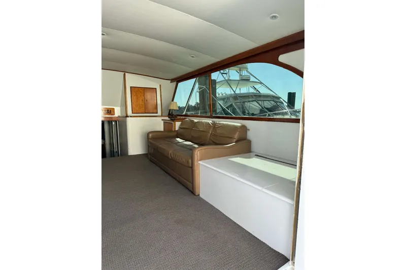 Slide: The Image of Interior of 1992 Blackwell Custom Carolina yacht with leather sofa and large window. - 9