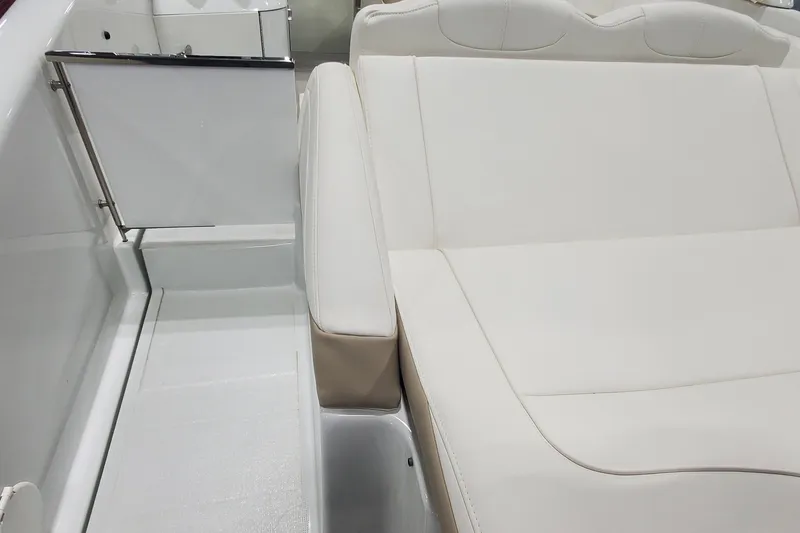 Slide: The Image of 2012 Formula 310 Sun Sport boat interior with white seating and sleek design. - 10