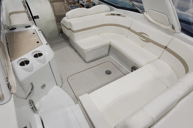 Slide: The Image of Luxurious interior of 2012 Formula 310 Sun Sport boat with plush seating and sleek design. - 11