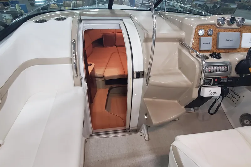 Slide: The Image of 2012 Formula 310 Sun Sport boat interior with cockpit and cabin view. - 30