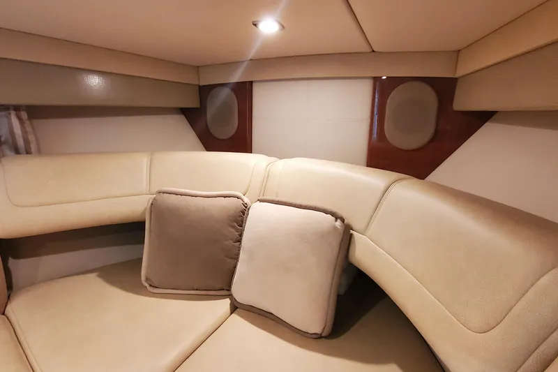 Slide: The Image of Luxurious interior of 2012 Formula 310 Sun Sport boat with beige seating and cushions. - 33