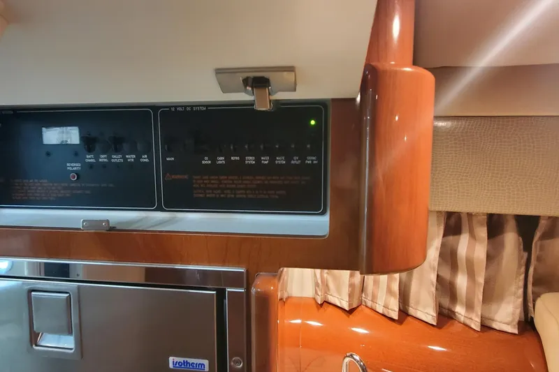 Slide: The Image of Control panel and interior of 2012 Formula 310 Sun Sport boat. - 36