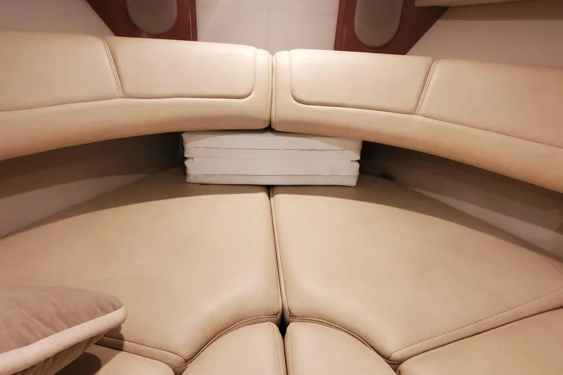 Slide: The Image of 2012 Formula 310 Sun Sport cabin interior with beige leather seating. - 39