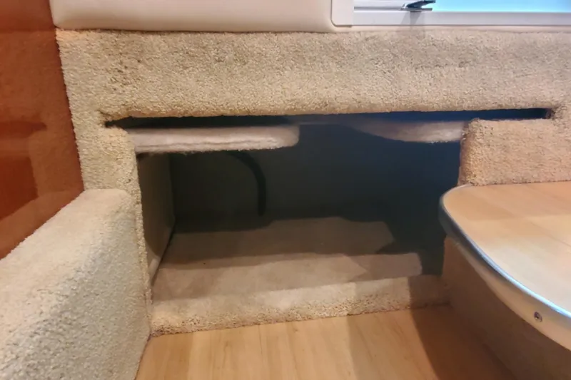 Slide: The Image of Interior cabin space of 2012 Formula 310 Sun Sport boat, featuring carpeted surfaces. - 41