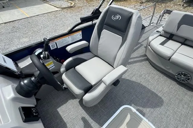 Slide: The Image of 2026 Barletta ARIA 22UC boat interior with captain's chair and seating area. - 14