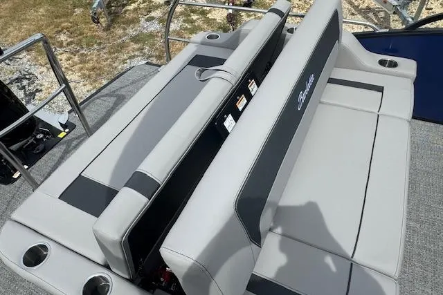 Slide: The Image of 2026 Barletta ARIA 22UC boat interior with gray seating and cup holders. - 17