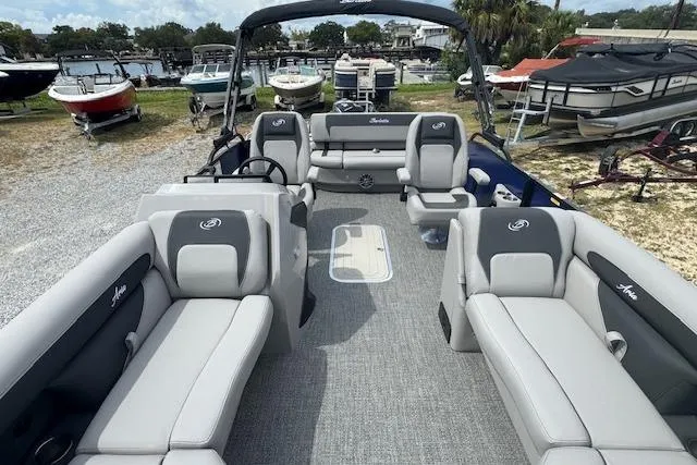 Slide: The Image of 2026 Barletta ARIA 22UC pontoon boat with spacious seating and modern design. - 9