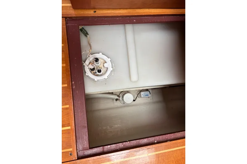 Slide: The Image of Bilge compartment of 2004 Sabre 42 Fly Bridge boat, showing wiring and components. - 32