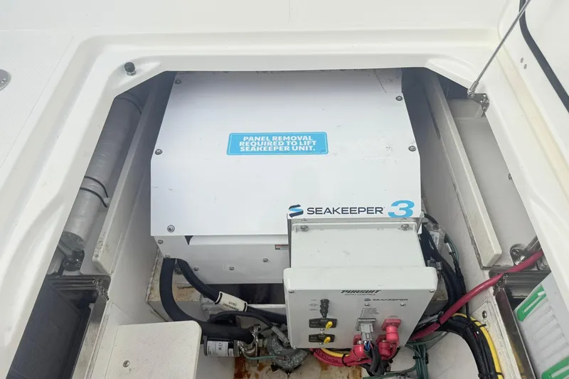 Slide: The Image of 2022 Pursuit DC 365 Dual Console with Seakeeper 3 stabilizer unit installed. - 23