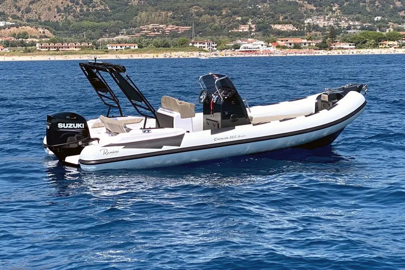 The Image of 2026 Ranieri Cayman 23.0 Sport boat on blue ocean water. - 0