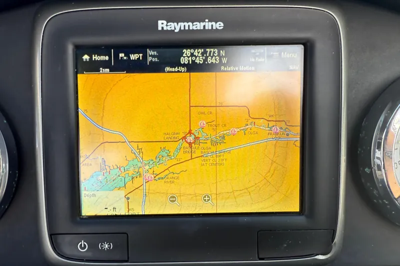 Slide: The Image of Raymarine GPS display on 2014 Sea Ray 220 Sundeck showing navigation map. - 14