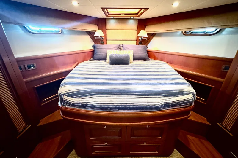 Slide: The Image of Luxurious bedroom interior of 2012 Grand Banks 53 Aleutian RP yacht. - 13