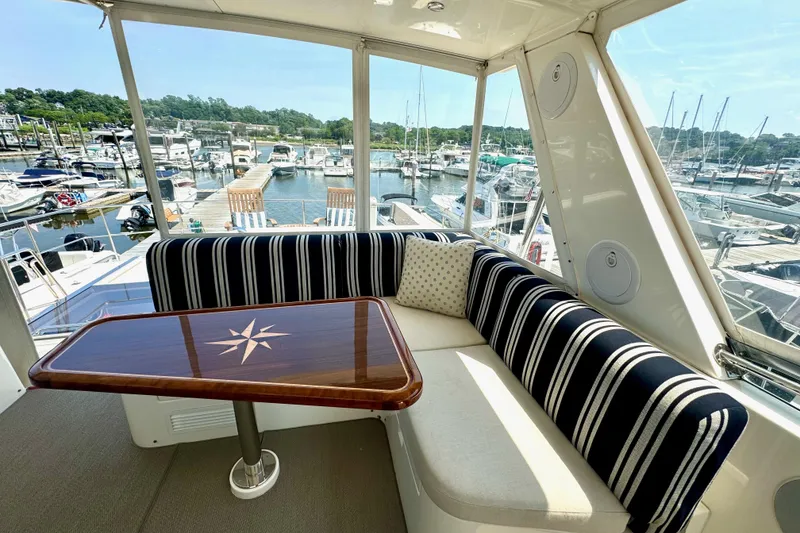 Slide: The Image of Luxurious interior of 2012 Grand Banks 53 Aleutian RP yacht with marina view. - 20