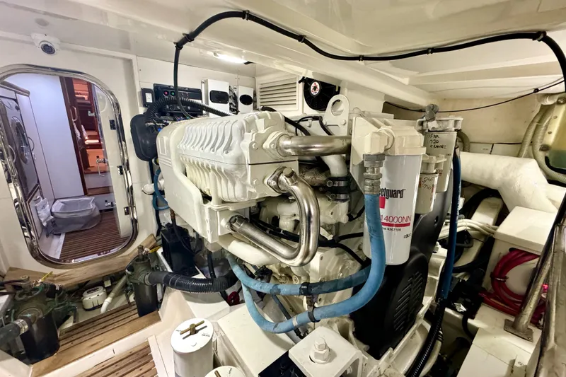 Slide: The Image of Engine room of 2012 Grand Banks 53 Aleutian RP yacht, showcasing machinery and components. - 25