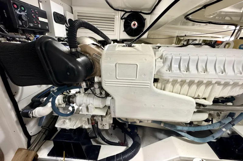 Slide: The Image of Engine room of 2012 Grand Banks 53 Aleutian RP yacht, showcasing detailed machinery. - 26