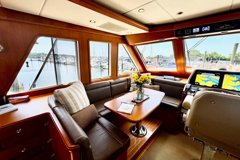 Slide: The Image of Luxurious interior of 2012 Grand Banks 53 Aleutian RP yacht with scenic marina view. - 5