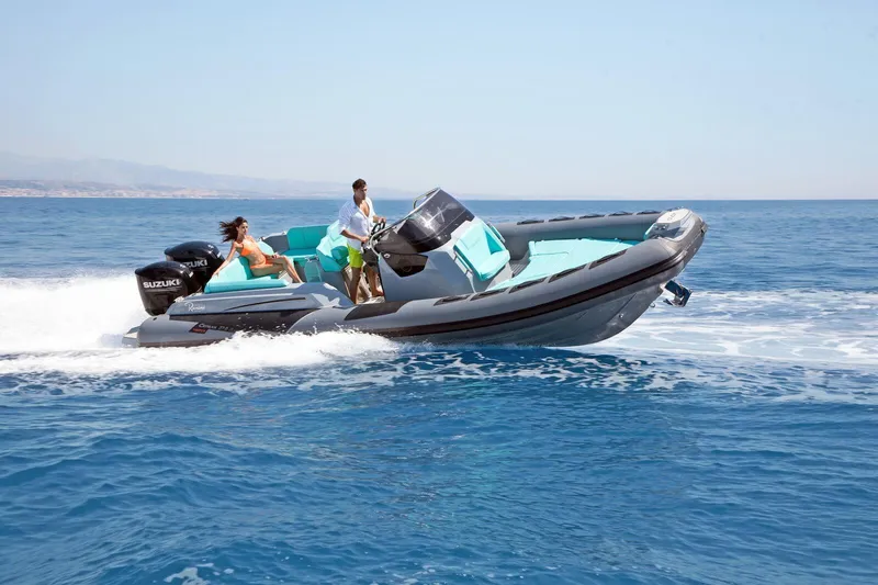 Slide: The Image of 2026 Ranieri CAYMAN 27.0 SPORT TOURING cruising on open sea with passengers. - 2