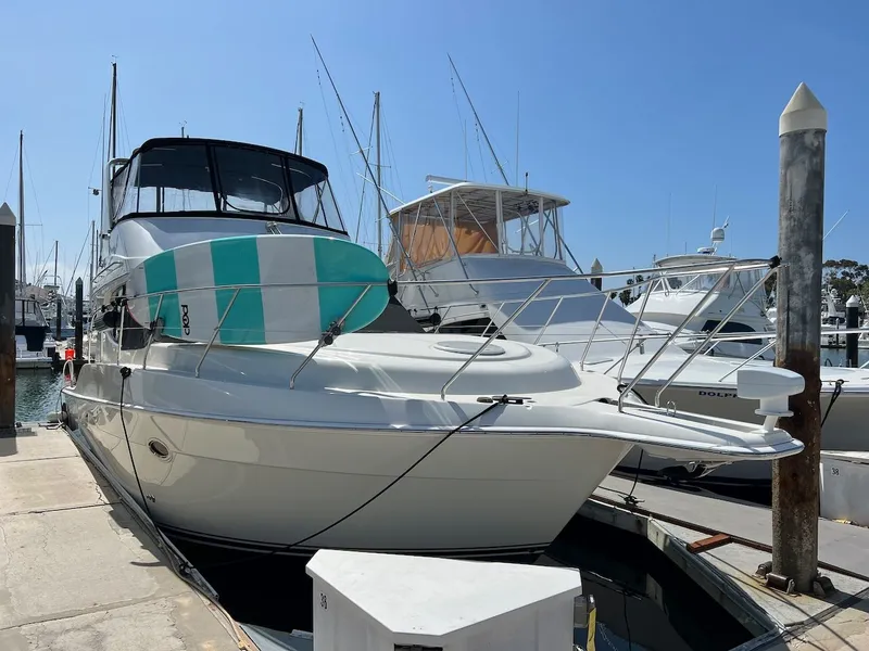 The Image of 2007 Silverton 36 Convertible Yacht docked at marina. - 0
