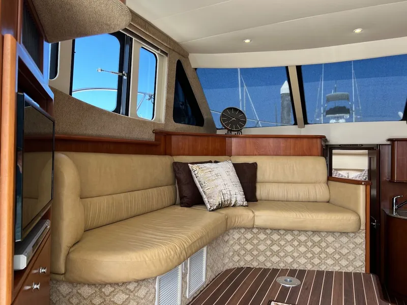 Slide: The Image of Interior of 2007 Silverton 36 Convertible with sink and storage area. - 11