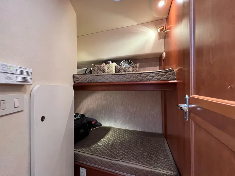 Slide: The Image of JL Audio speaker on wood paneling, Silverton 36 Convertible 2007. - 22