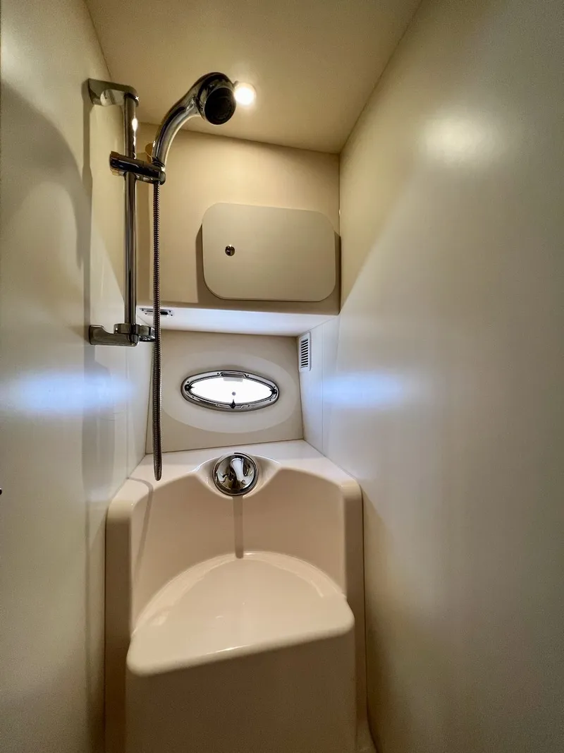 Slide: The Image of Interior of 2007 Silverton 36 Convertible with modern kitchen. - 26