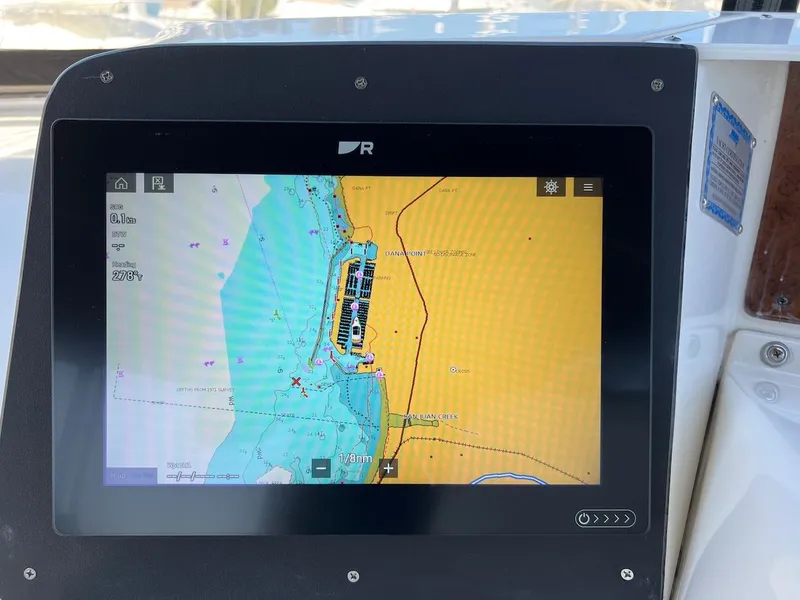 Slide: The Image of Interior of 2007 Silverton 36 Convertible yacht in harbor. - 42