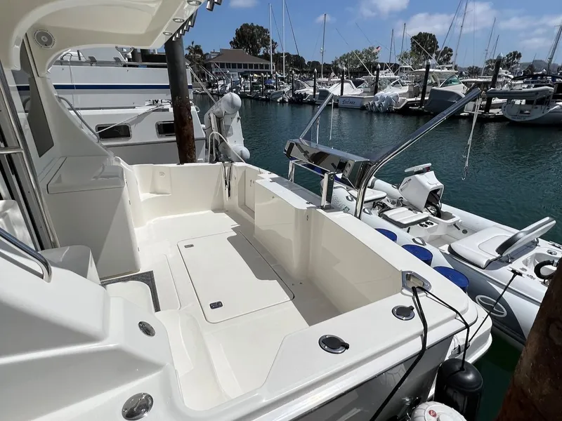 Slide: The Image of 2007 Silverton 36 Convertible with fishing rod holders on deck. - 6