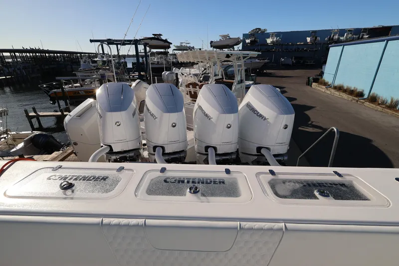 Slide: The Image of Interior view of 2026 Contender 44 CB boat cockpit with modern navigation system. - 10