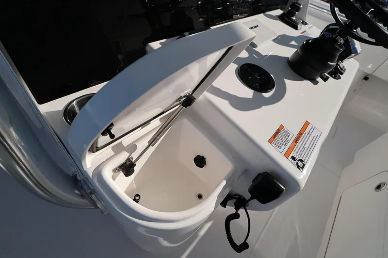 Slide: The Image of Luxury seating on 2026 Contender 44 CB boat with wooden accents and white cushions. - 20