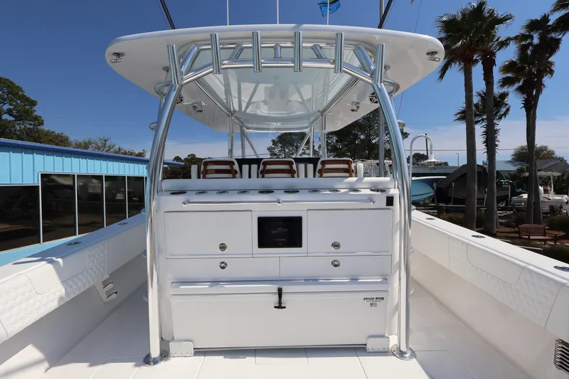 Slide: The Image of 2026 Contender 44 CB boat with sleek design and modern amenities. - 53