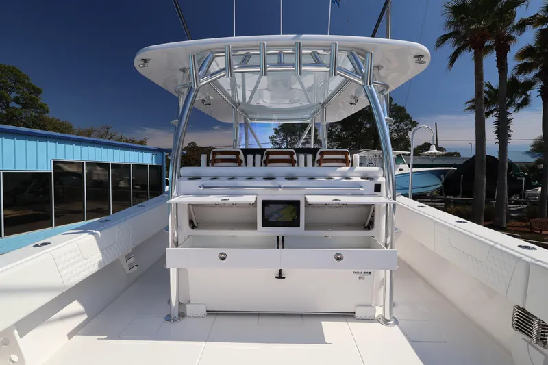 Slide: The Image of 2026 Contender 44 CB boat interior with helm station and seating. - 54