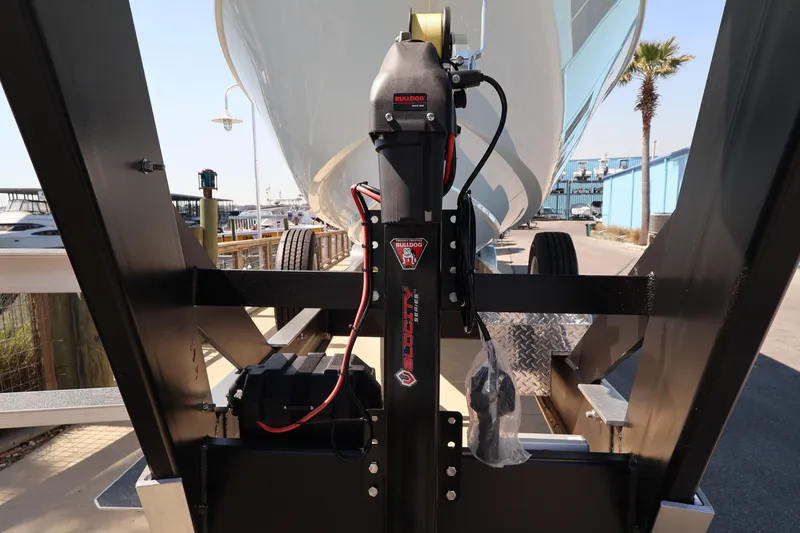 Slide: The Image of Electrical compartment of 2026 Contender 44 CB boat, featuring safety warning labels. - 64