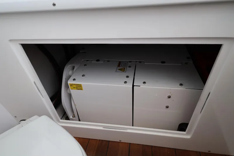 Slide: The Image of DeeMaxx disc brakes on Contender 44 CB, 2026 model, close-up view. - 69