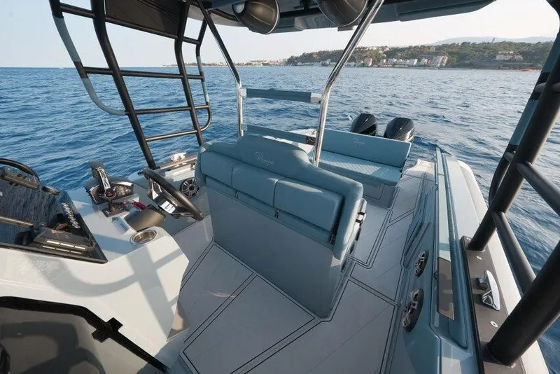 Slide: The Image of 2026 Ranieri CAYMAN 33.0 EXECUTIVE boat interior on open water. - 22