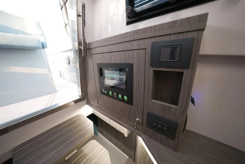 Slide: The Image of Control panel inside 2026 Ranieri CAYMAN 33.0 EXECUTIVE boat, featuring modern design elements. - 9